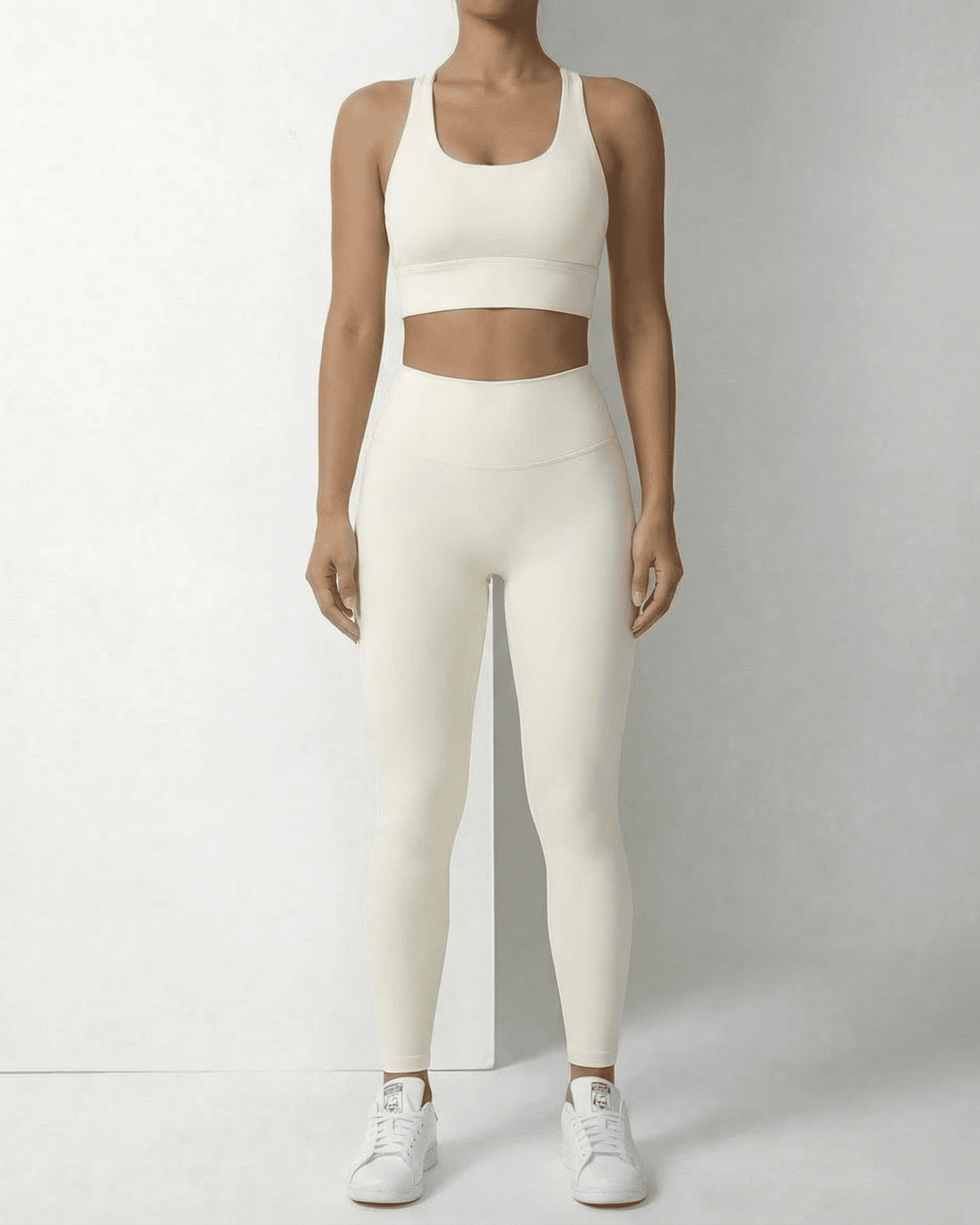 Iris Leggings Cream by SLIMONA, sleek ankle-length leggings with pockets, offering comfort and style.