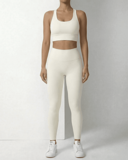 Iris Leggings Cream by SLIMONA, sleek ankle-length leggings with pockets, offering comfort and style.