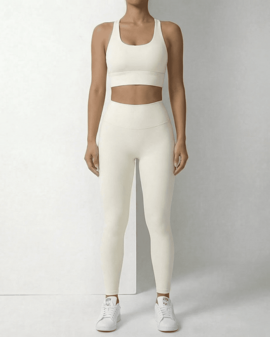 Iris Leggings Cream by SLIMONA, sleek ankle-length leggings with pockets, offering comfort and style.
