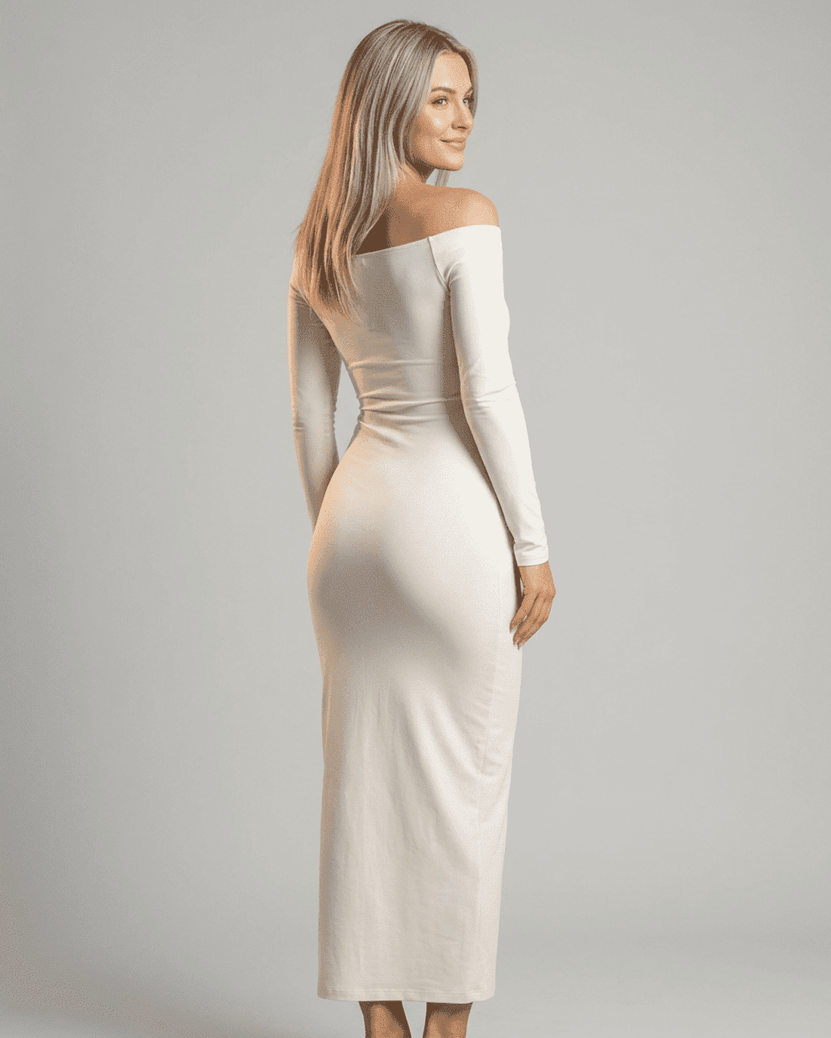 Ivory Maxi Dress by SLIMONA featuring off-shoulder design and long sleeves for an elegant look.