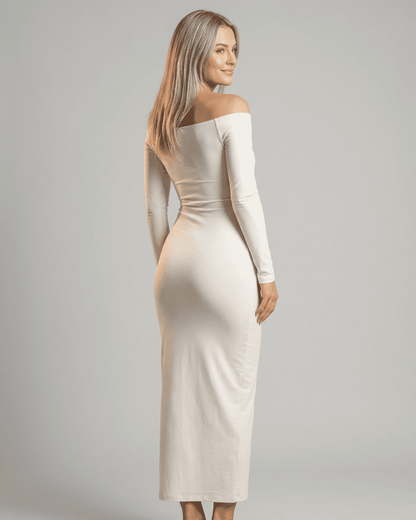 Ivory Maxi Dress by SLIMONA featuring off-shoulder design and long sleeves for an elegant look.