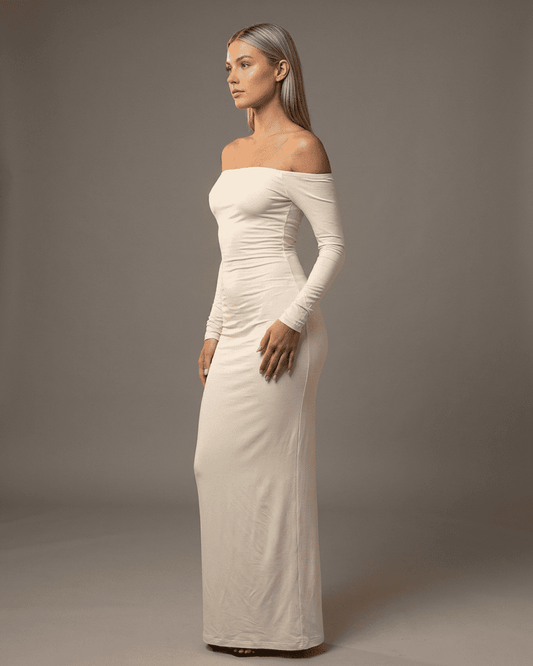 Ivory Maxi Dress by SLIMONA - Elegant off-shoulder design with long sleeves, perfect for any occasion.