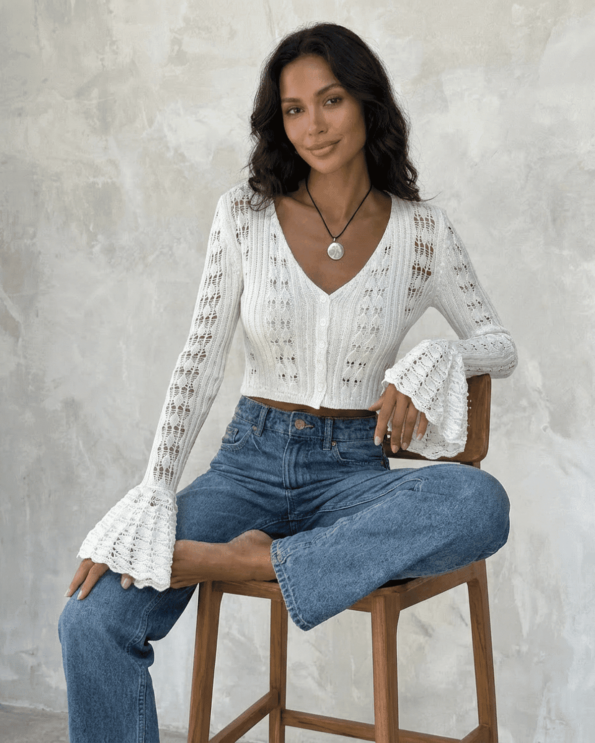 Laceflare Cardigan from SLIMONA featuring elegant white cotton knitwear with flare sleeves and a flattering V-neckline.