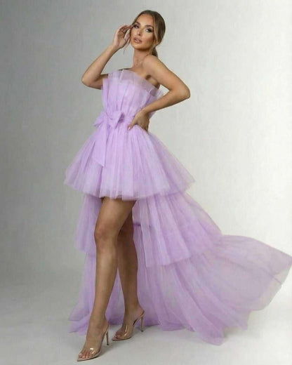 Lilacina Maxi Dress by Lauven – Strapless lilac tulle gown with high-low skirt and bow detail.