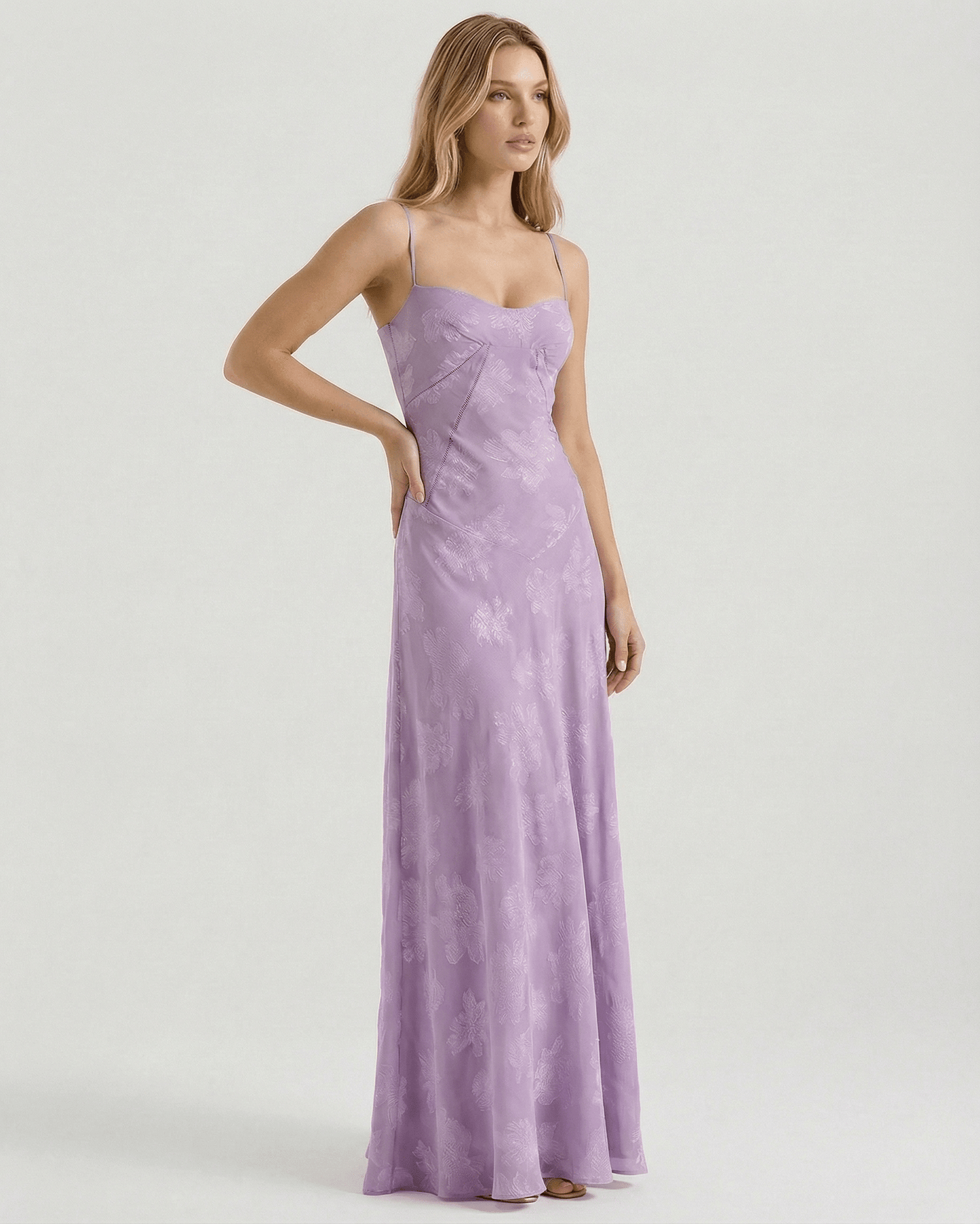 Liliora Maxi Dress by Lauven features a floral print in soft lavender with a lace-up back and elegant floor-length silhouette.