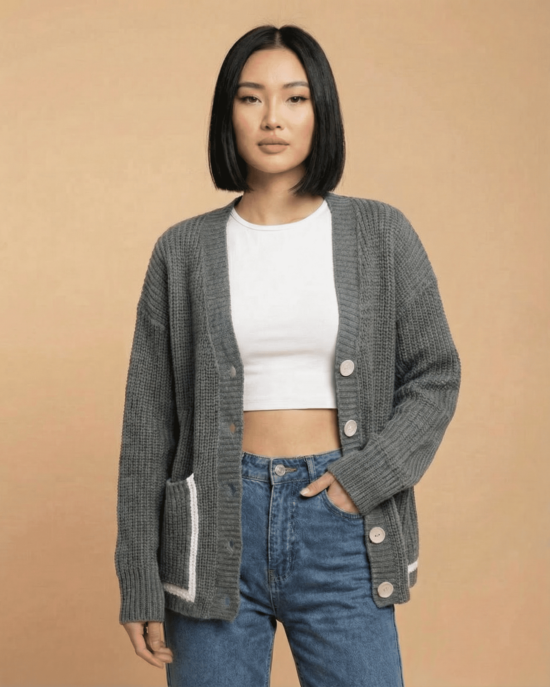 Linden Cardigan by SLIMONA in gray, featuring a relaxed V-neck and button-front design for stylish layering.