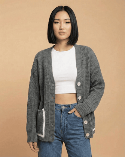 Linden Cardigan by SLIMONA in gray, featuring a relaxed V-neck and button-front design for stylish layering.
