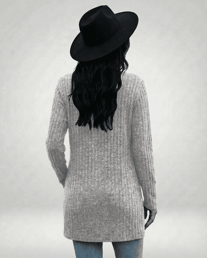 Luna Cardigan by SLIMONA, showcasing a longline knit design with ribbed texture, perfect for modern women's fashion.