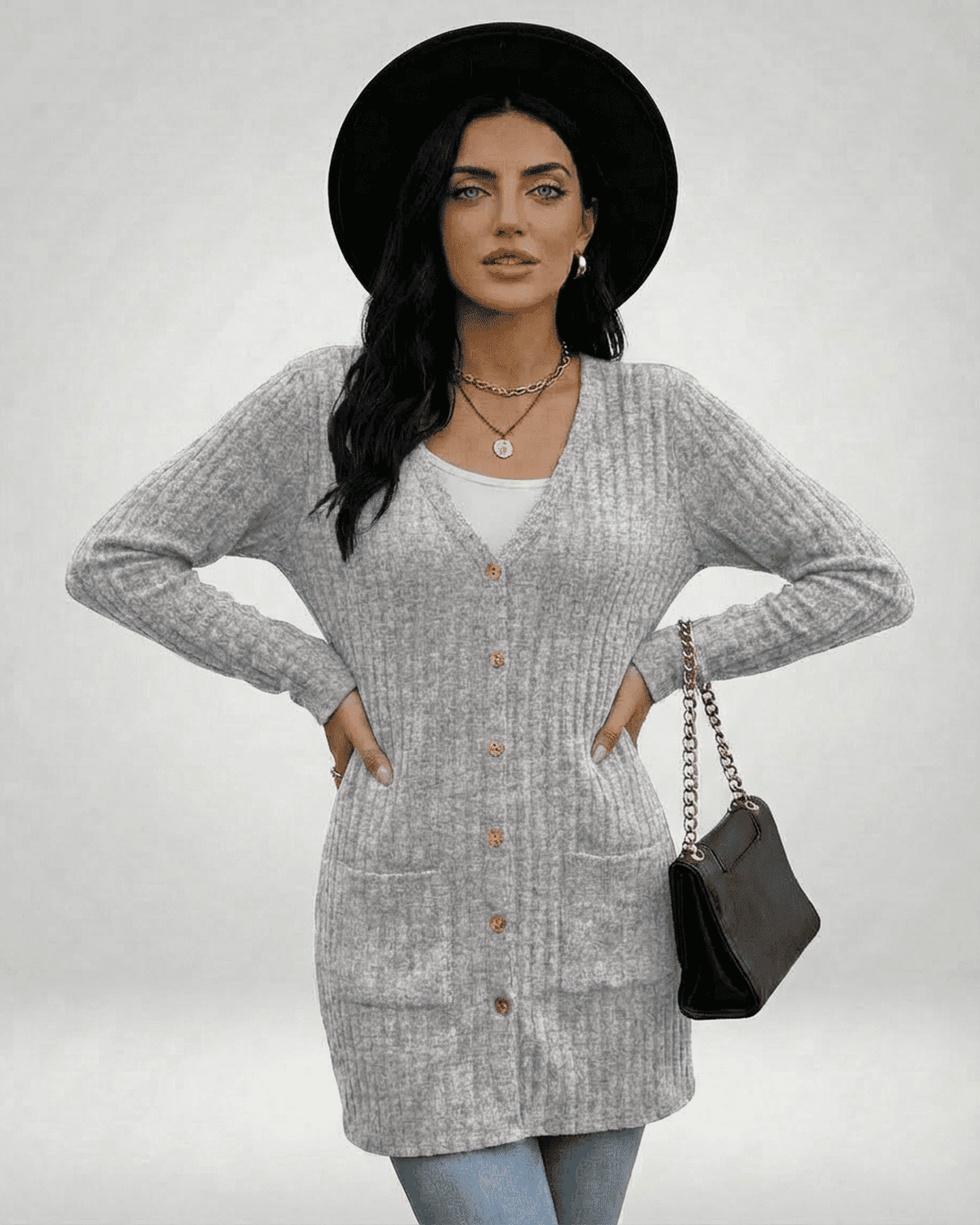 Luna Cardigan by SLIMONA, a stylish longline knitwear with ribbed texture and button-front design.