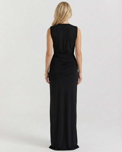 Back view of the SLIMONA Luna Maxi Dress, showcasing the elegant silhouette and refined design.