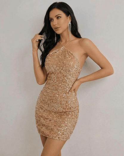 Luna Mini Dress by SLIMONA, gold sequin halter neck mini dress with a sleek silhouette for modern evening wear.