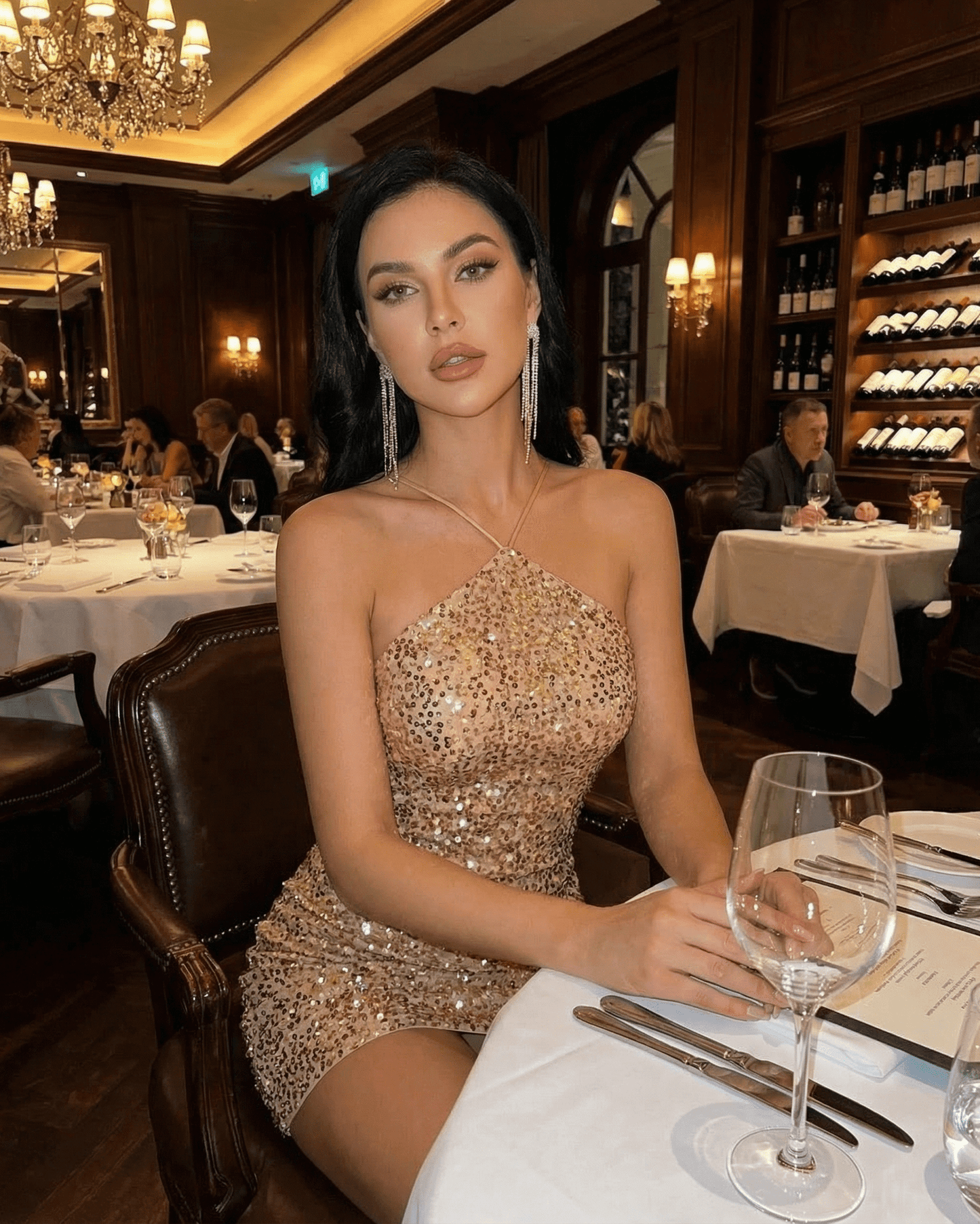 Luna Mini Dress by SLIMONA, a gold sequin halter neck mini dress, perfect for elegant evenings.