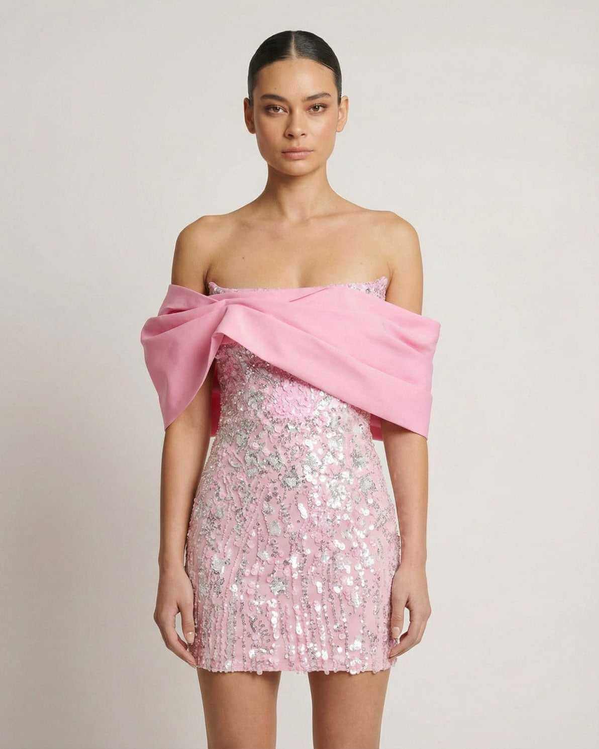 Luna Mini Dress by Lauven: pink sequin strapless party dress with elegant off-the-shoulder detail.