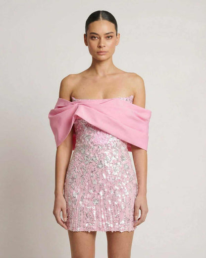 Luna Mini Dress by Lauven: pink sequin strapless party dress with elegant off-the-shoulder detail.