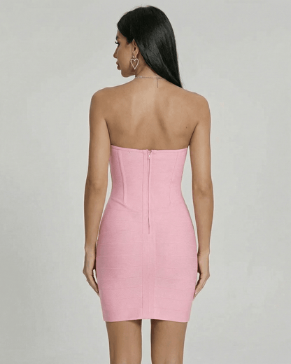 Back view of the Luna Mini Dress by Lauven, showcasing its sleek strapless design and fitted silhouette.