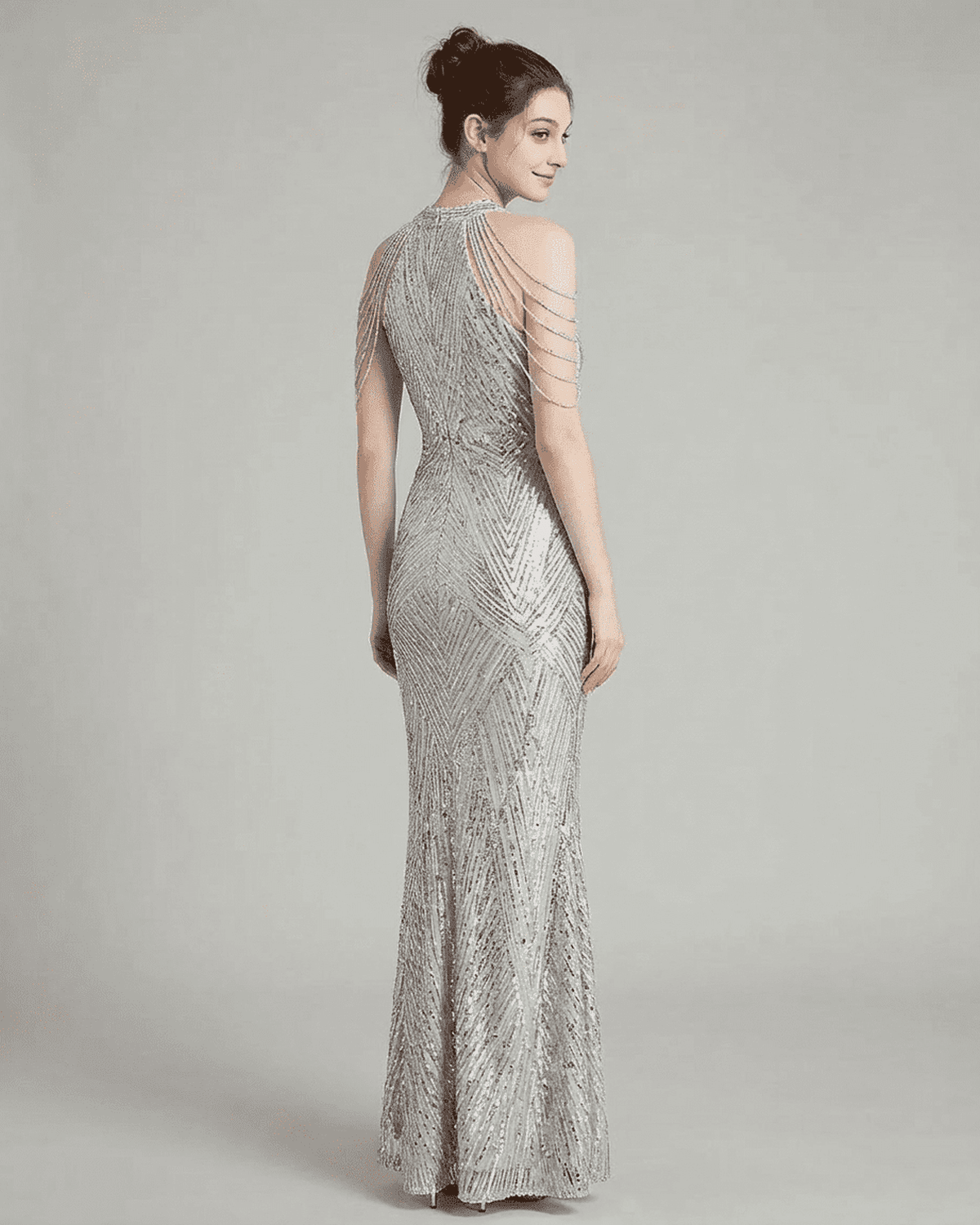 Luxe Maxi Dress by SLIMONA featuring silver sequin fabric and elegant halter design, showcasing a stunning mermaid silhouette.