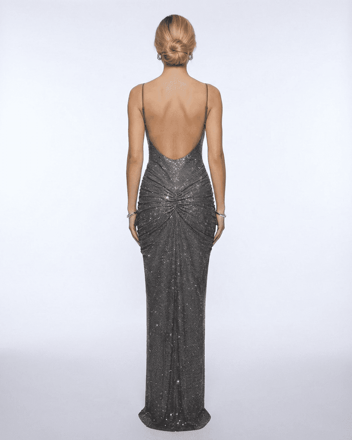 Lyra Maxi Dress by SLIMONA, showcasing a stunning back view with shimmering crystal embellishments.