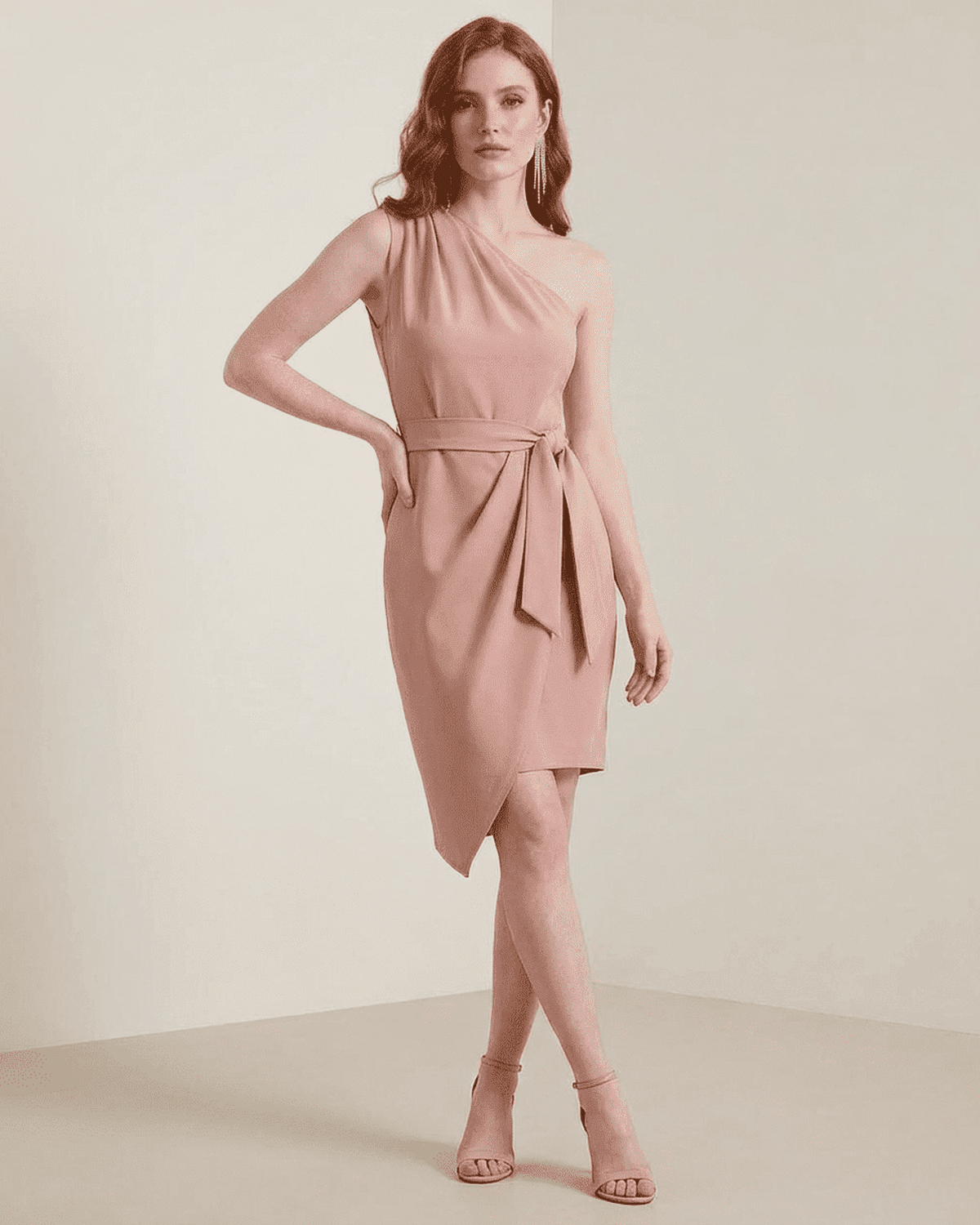 Lyra Mini Dress by SLIMONA in soft pink, showcasing a one-shoulder satin design with an asymmetrical hem.