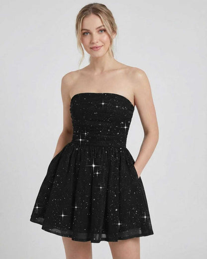 SLIMONA Lyra Mini Dress - Black strapless A-line dress with shimmer and bow detail for a polished look.