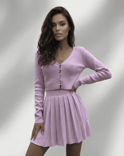 Lyra Two-Piece Set by SLIMONA featuring a soft knit cardigan and a pleated mini skirt in lavender color.
