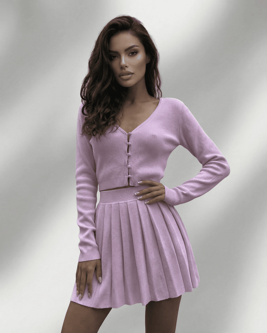Lyra Two-Piece Set from SLIMONA featuring a soft knit cardigan and pleated mini skirt in lavender for a chic look.