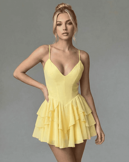 Marigold Mini Dress by SLIMONA, featuring a plunging V-neckline and tiered ruffle skirt, perfect for parties.