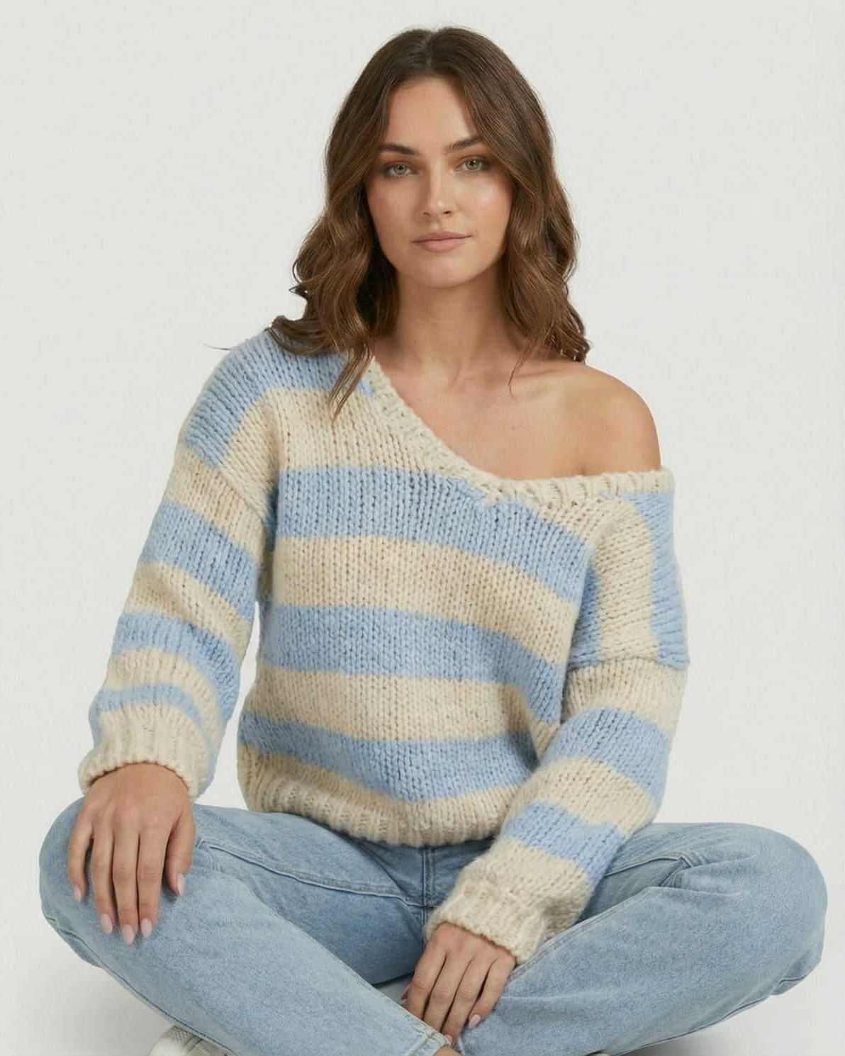 Marina Pullover by Lauven, a stylish striped V-neck knit sweater in light blue and ivory shades.