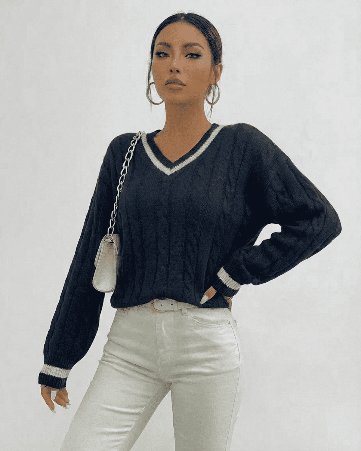 Marina Sweater by SLIMONA in cable knit v-neck style, perfect for modern everyday wear.