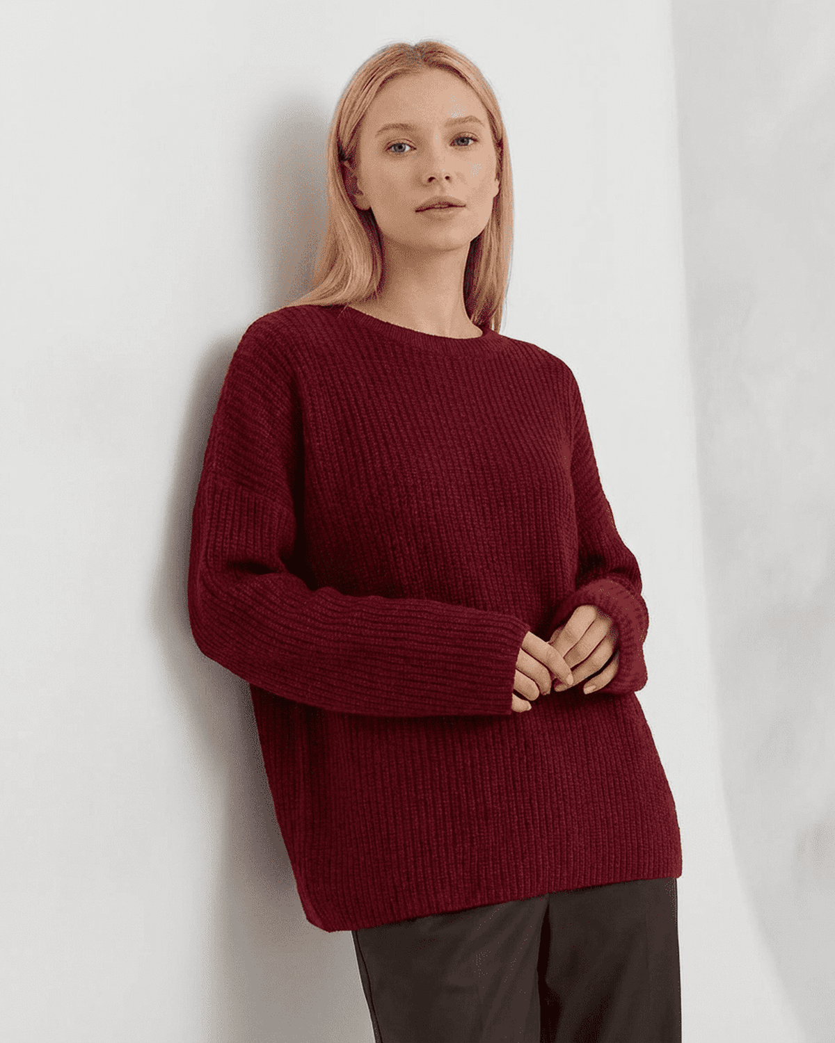 Marlo Sweater by SLIMONA in burgundy, showcasing loose fit ribbed knitwear with round neck.