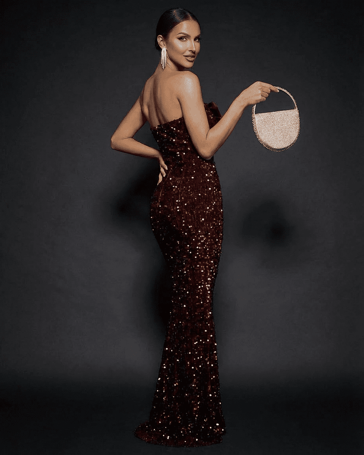 Marquise Maxi Dress by SLIMONA, showcasing a strapless sequin design and thigh-high slit for evening elegance.