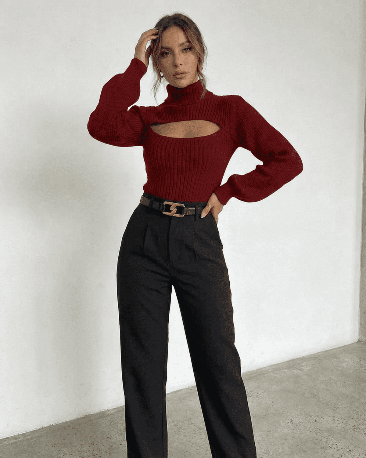 Model wearing the Merlot Sweater by SLIMONA featuring mock neck and cut-out detail.