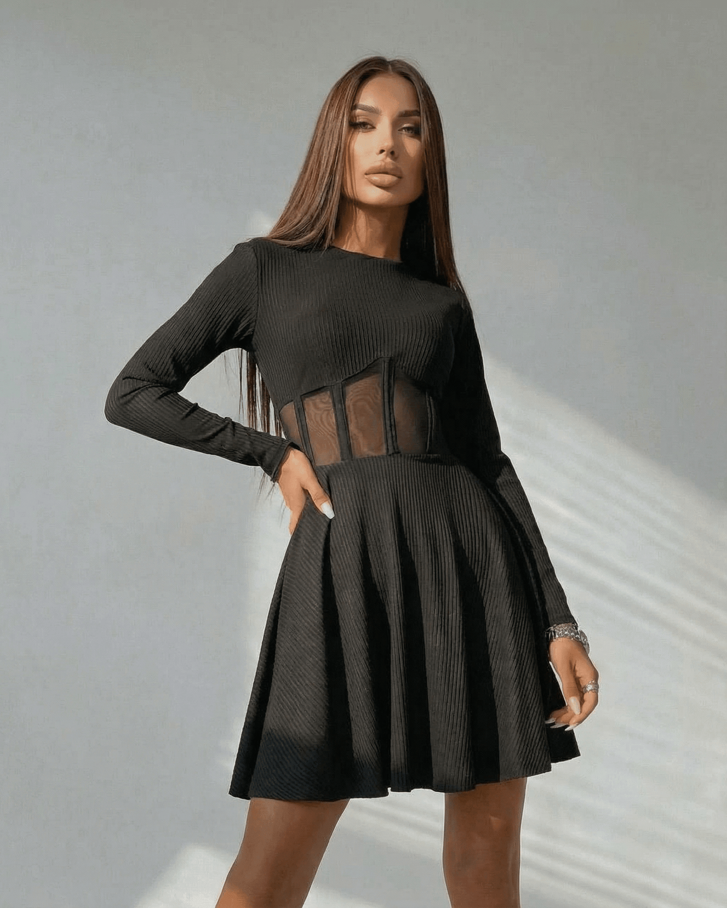 Monaco Mini Dress by Lauven – Black long sleeve A-line dress with sheer corset detail, perfect for elegant occasions.
