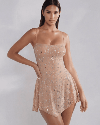 Monaco Mini Dress by SLIMONA, embellished mermaid-style dress with square neckline in soft nude tone.