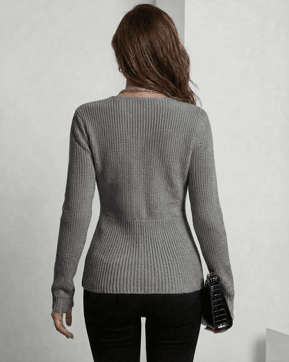 back view of Nerina Pullover by SLIMONA, a sophisticated ribbed slim fit V-neck sweater in elegant grey.