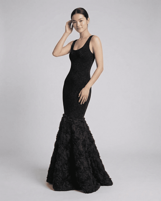 Nocturne Maxi Dress by SLIMONA featuring a sculpted silhouette and textured hem detail in elegant black.