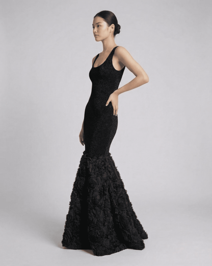 Nocturne Maxi Dress by SLIMONA featuring a sculpted silhouette and textured hem detail in elegant black.