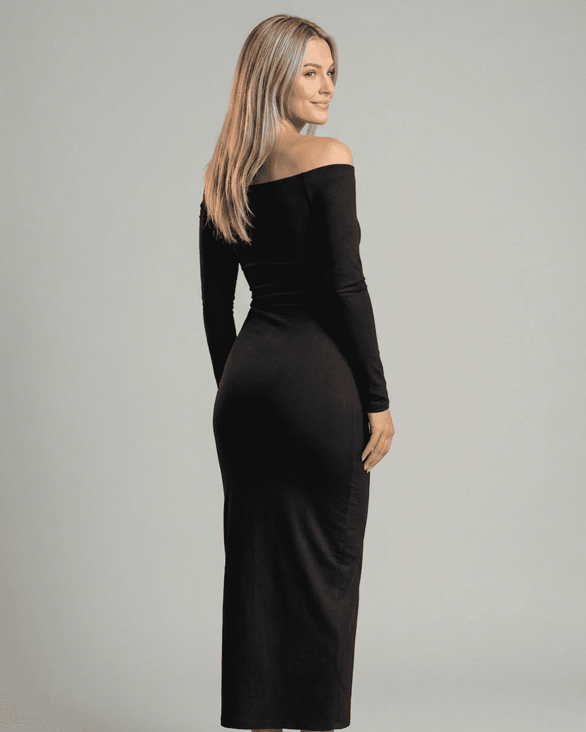 Nocturne Maxi Dress by SLIMONA, showcasing an off-shoulder design with long sleeves in a stylish silhouette.