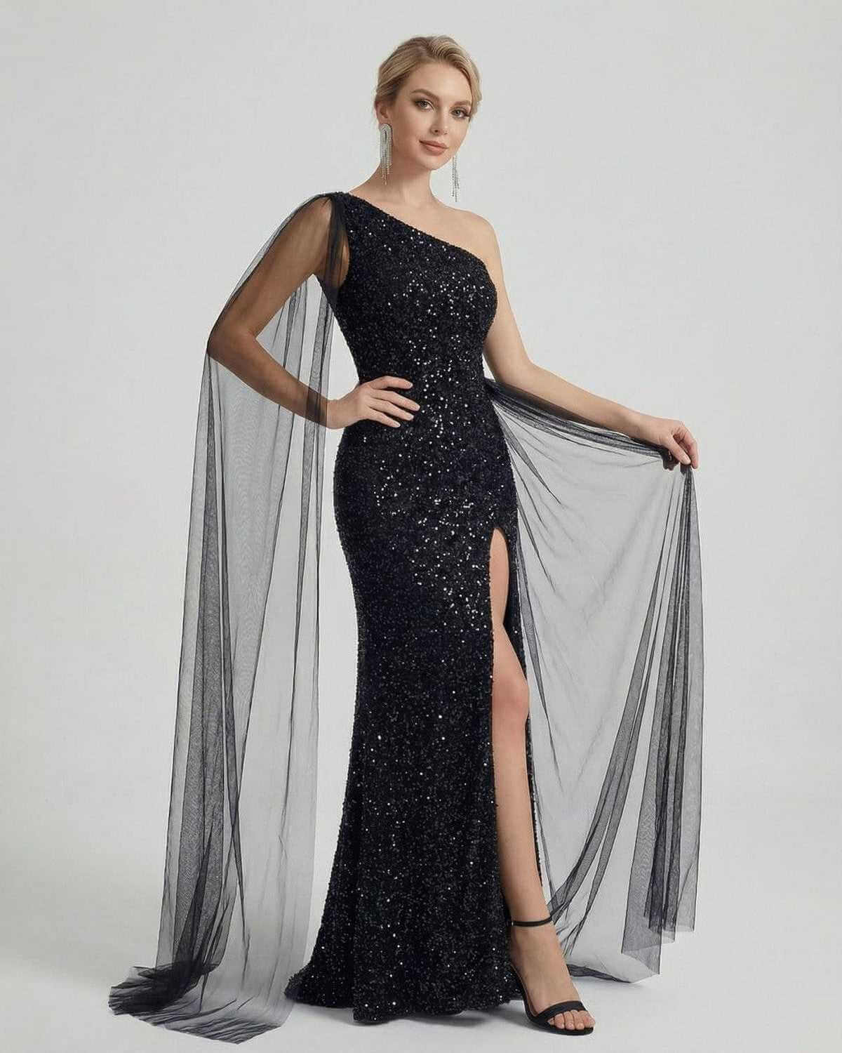 Nocturne Maxi Dress by SLIMONA, featuring a one shoulder sequin design with sheer mesh drape and side slit.