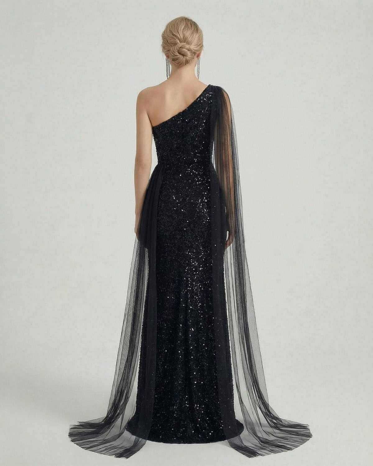 Nocturne Maxi Dress by SLIMONA, black one shoulder sequin dress with sheer mesh drape, elegant back view.
