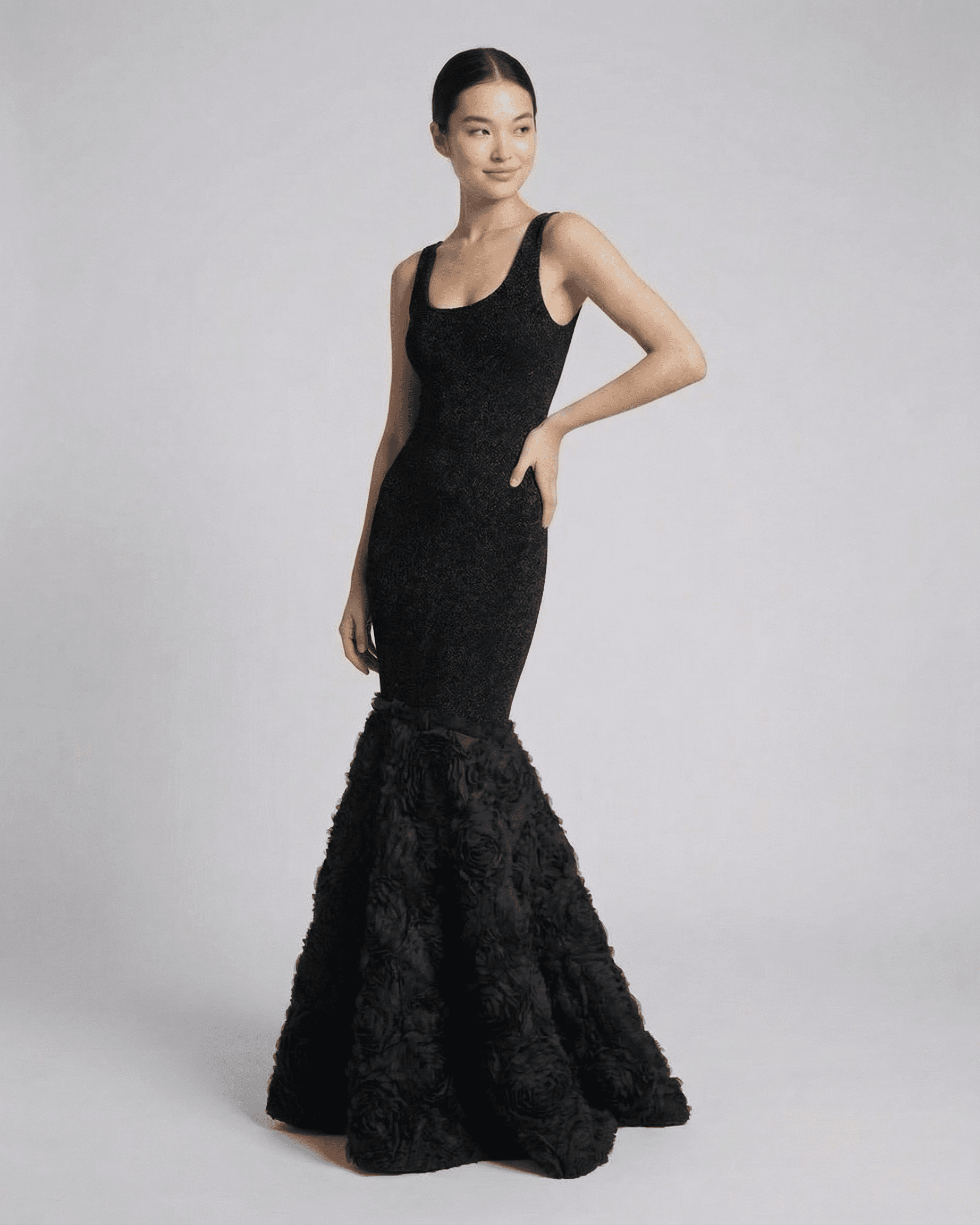Nocturne Maxi Dress by SLIMONA features a sculpted silhouette with textured hem, perfect for evening elegance.