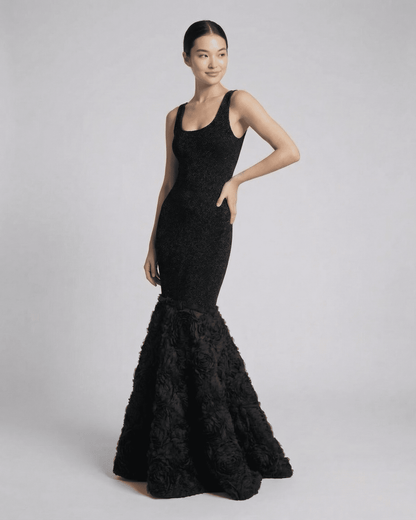Nocturne Maxi Dress by SLIMONA features a sculpted silhouette with textured hem, perfect for evening elegance.