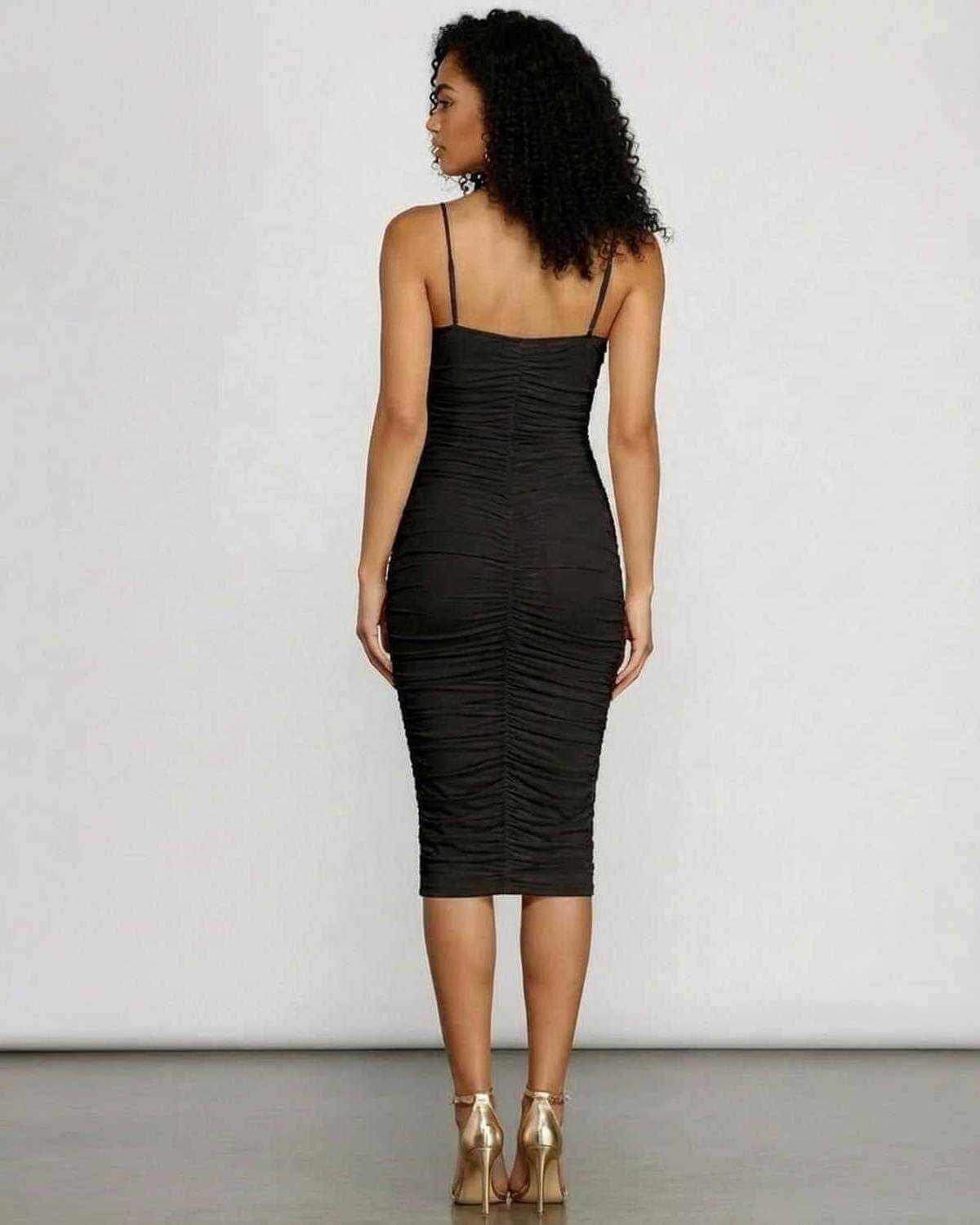Noctyra Midi Dress by SLIMONA, black ruched bodycon silhouette, back view showcasing the sleek design.