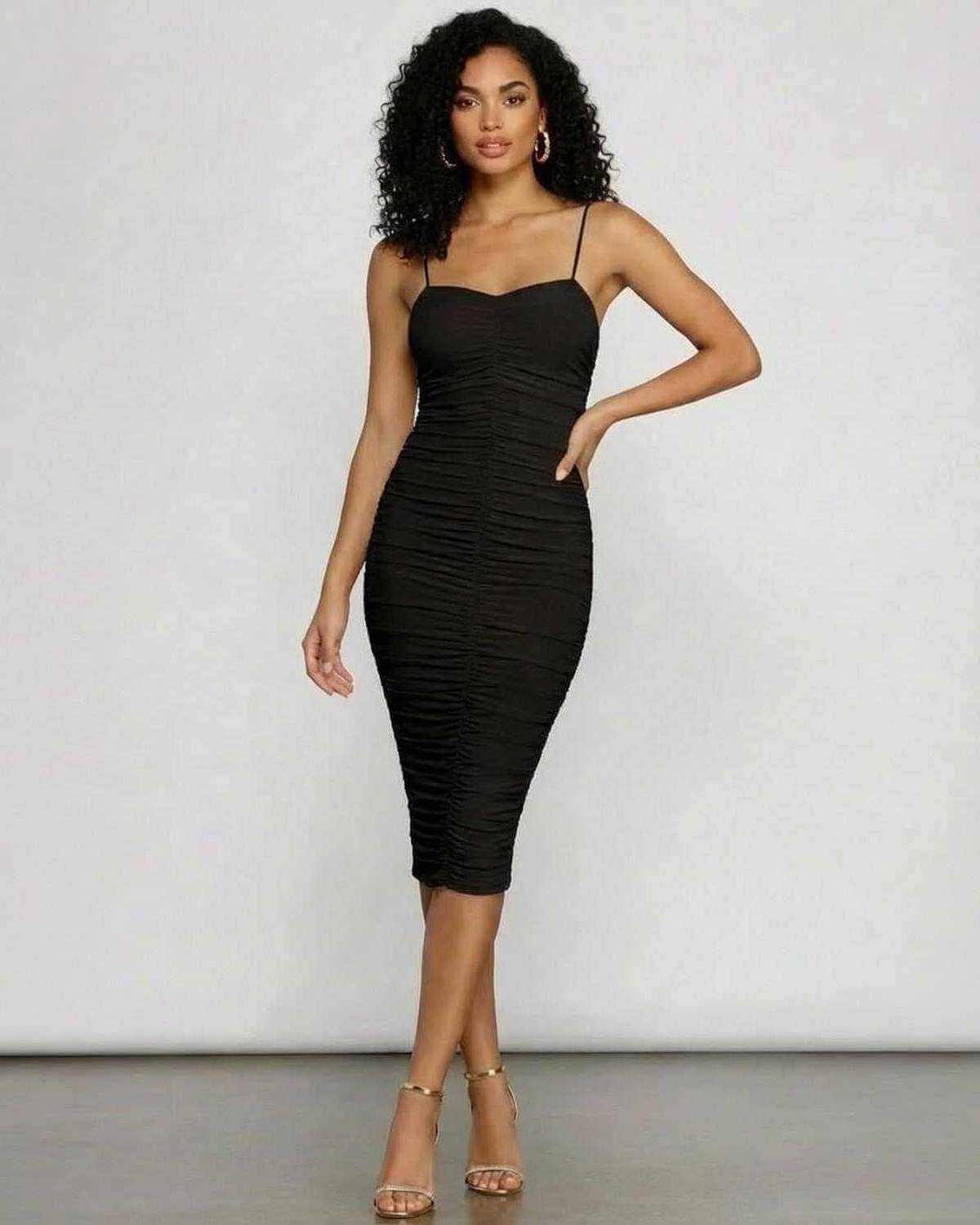 Noctyra Midi Dress by SLIMONA, showcasing a sleek, ruched bodycon silhouette with a sweetheart neckline.