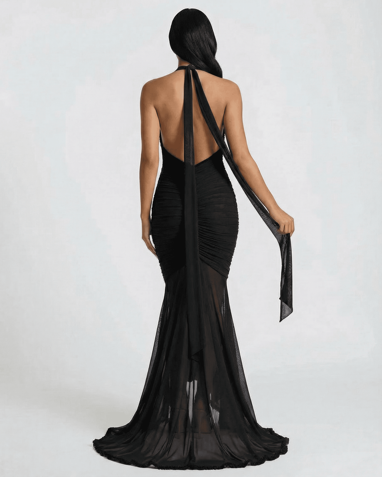 Noir Maxi Dress by SLIMONA, black ruched maxi slip dress with lace trim, showcasing elegant back view.