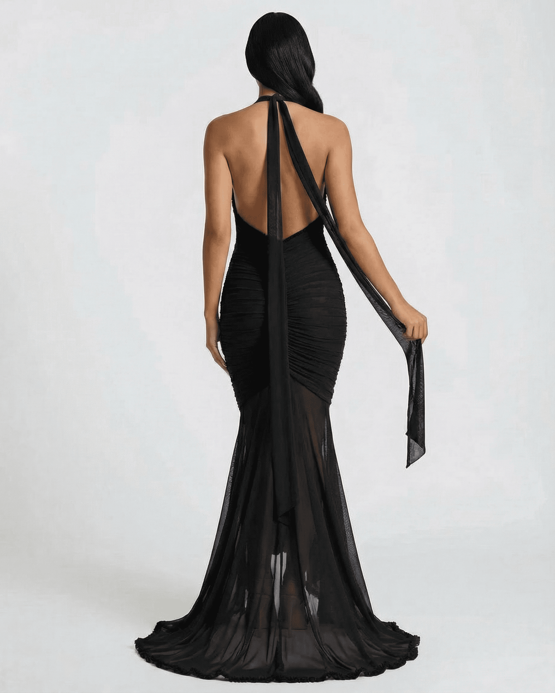 Noir Maxi Dress by SLIMONA, black ruched maxi slip dress with lace trim, showcasing elegant back view.