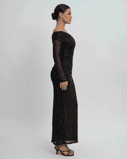 Noir Maxi Dress by SLIMONA, elegant off-the-shoulder mesh gown with sequins, showcasing a flattering silhouette.