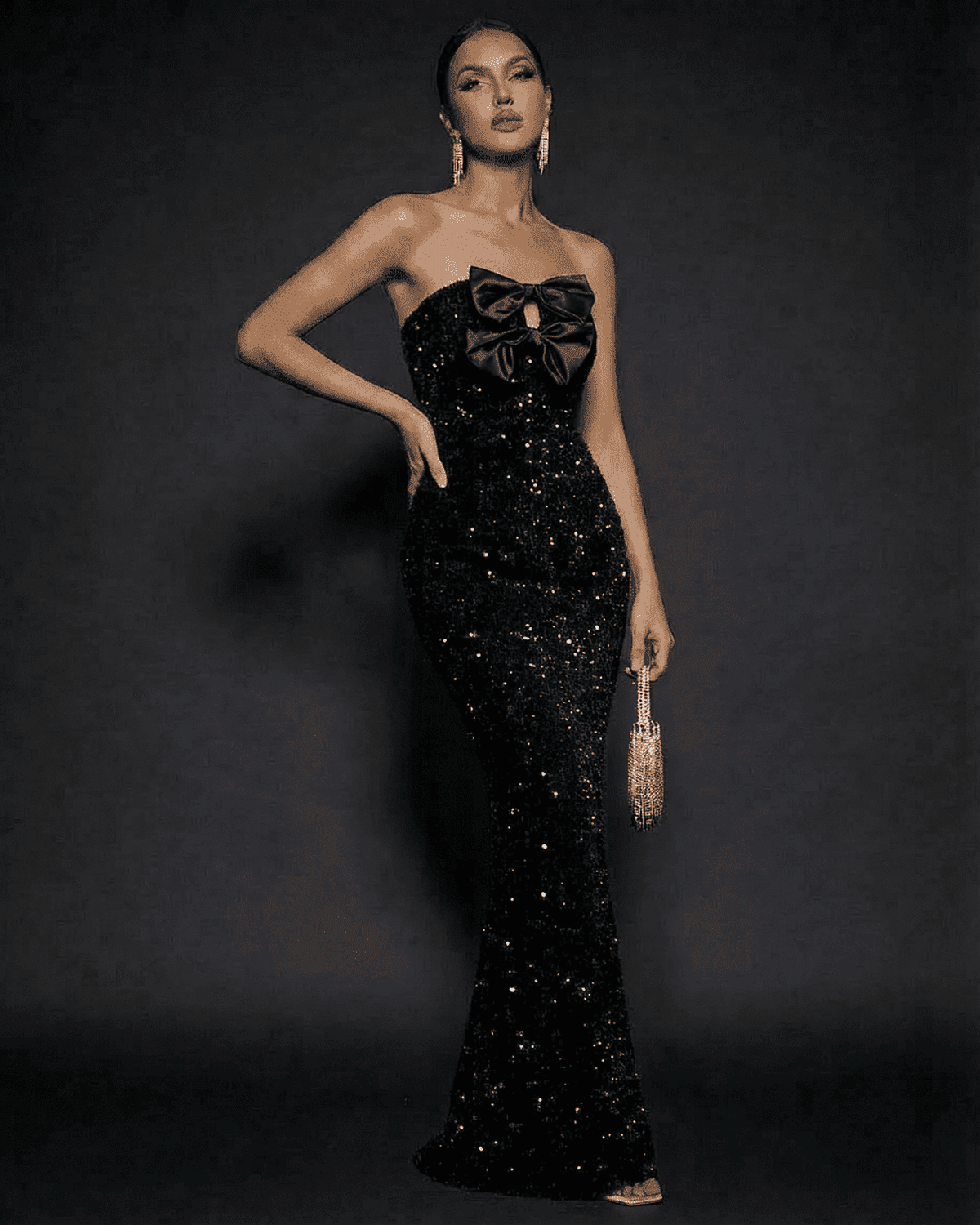 Noir Maxi Dress by SLIMONA, elegant strapless sequin gown with satin bow detail, perfect for formal events.