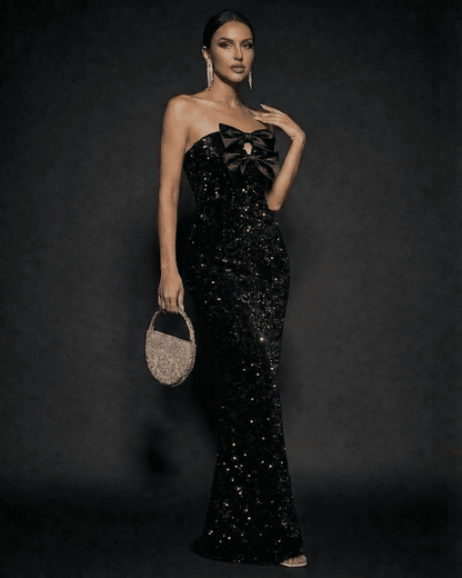 Noir Maxi Dress by SLIMONA, elegant strapless sequin gown with satin bows, perfect for evening events.