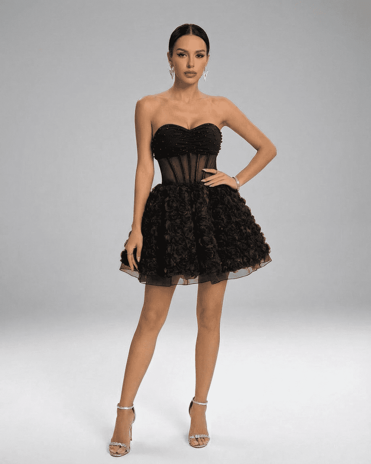 Noir Mini Dress by SLIMONA - Strapless black beaded puff mini with 3D floral texture, refined corset-style silhouette.
