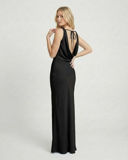 Noiré Maxi Dress by SLIMONA showcasing a satin-effect finish and cowl neck design, perfect for elegant occasions.
